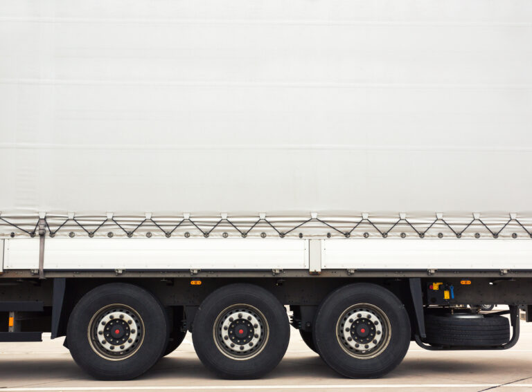 Cargo truck. Space for text on trailer